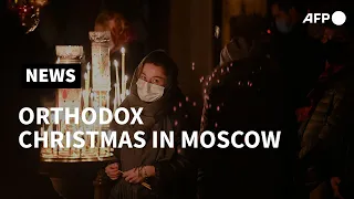 Russians attend Orthodox Christmas mass in Moscow | AFP