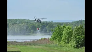 UH60 drops water bucket