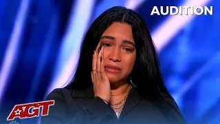 Women sings in honor of parents that were killed