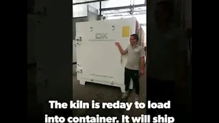 Loading the high frequency vacuum dry kiln into Container