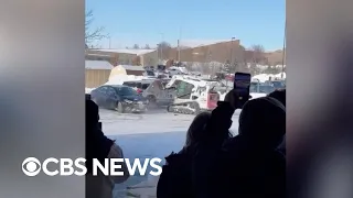 Video shows man ramming skid loader into police cruiser in Nebraska