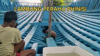 traditional phinisi boat hull cleaning