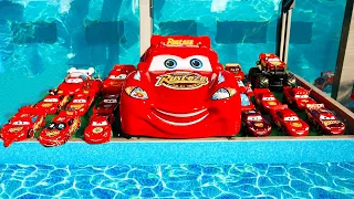 Disney Pixar Cars falling into deep pool, Lightning McQueen, Tow Mater, Mack, Sally, Francesco