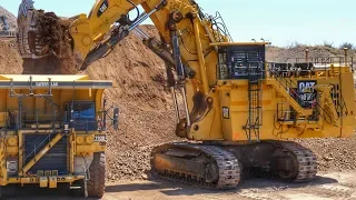 Caterpillar 6060 Face Shovel loading Autonomous Trucks