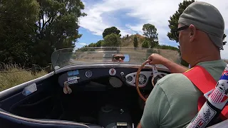 Onboard 1956 Austin Healey 100M Road Tour. Port Hills Summit Road Christchurch. New Zealand.