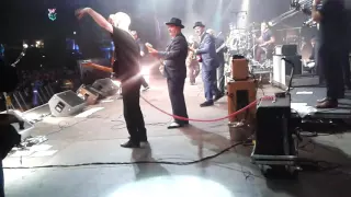 Wilko johnson and Norman Watt Roy on stage with Madness Inverness Belladrum 2016