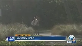 Mystery man rescues swimmer