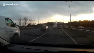 White van rams car on UK motorway