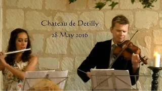 Flute and violin play Pachelbel's Canon for bride's entry.