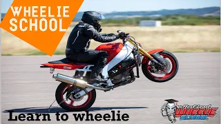 HOW TO WHEELIE.. Next Level Wheelie School