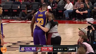 Lebron James Runs into Vendor then Helps Her Get up