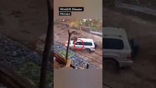 😥OMG! Shocking Footage of a Person Being Dragged by Their Car in a Flood #flooding