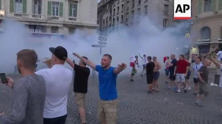 Riot police and football fans clash in Marseille