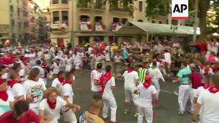 Participants gored during the running of the bulls