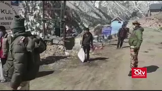 ITBP troops distribute ration to locals in Chitkul, Himachal Pradesh