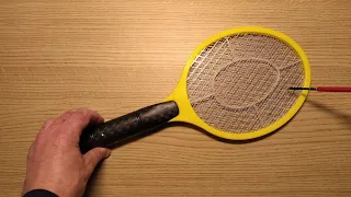 Inside Poundland's electric fly zapper bat.  (with schematic)