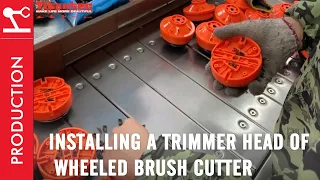 Installing A Trimmer Head Of Wheeled Brush Cutter