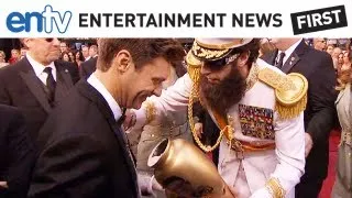 SACHA BARON COHEN ASHES SEACREST: Oscars prank dumps Kim Jong IL's Ashes on Ryan Seacrest: ENTV