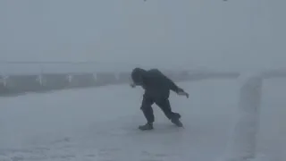 Watch this guy hilariously try to walk in 109 mph winds