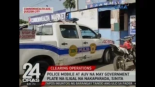 24 Oras: Police mobile at AUV na may government plate na iligal na nakaparada, sinita ng MMDA