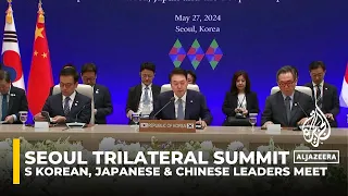 China urges South Korea, Japan to uphold free trade at three-way summit