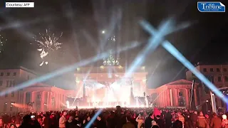 NEW YEAR'S LIGHT SHOW AND FIREWORKS AT THE BRANDENBURG GATE IN BERLIN