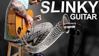 I Made A SLINKY TOY GUITAR And It Sounds Like Space Lasers In Huge Caves