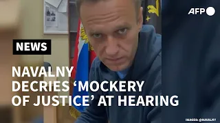 Kremlin critic Navalny decries 'mockery of justice' at hearing | AFP