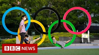 Japan lifts Covid restrictions a month before Tokyo 2020 - BBC News