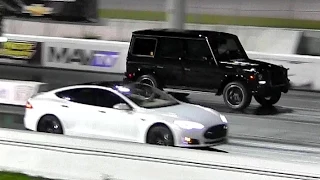 Tesla Model S P85 vs 536 HP TT Mercedes G63 AMG - 1/4 Mile Drag Race Video - Road Test TV ®