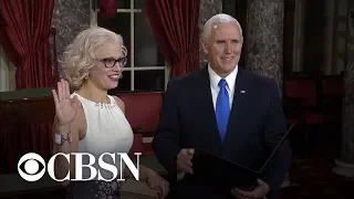 Kyrsten Sinema takes oath as senator on copy of constitution