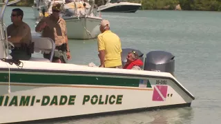 2 men survive after boat capsizes off Key Biscayne