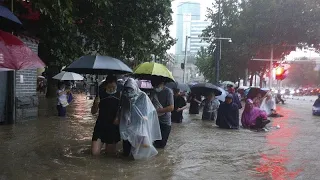 Flooding in central China turns streets to rivers, kills at least 25