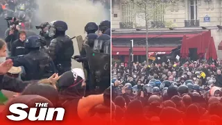 Paris police strike protesters with batons ahead pension reform vote