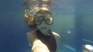 Selfie swim with underwater girl having fun blowing bubbles! #H2Opus #underwaterphotography