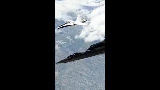 SR-71 Blackbird flying in close formation with an F-18 Hornet