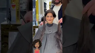 Watch her go from super long hair to a pixie haircut!