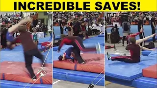 Gymnasts Being Saved by Their Spotter