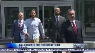 Bail conditions loosened for Toronto cop, brother accused of assault