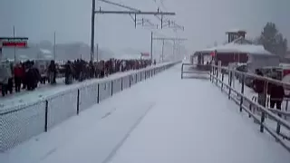 MUST SEE!! Acela with tons and tons of horn flying through the snow