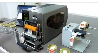 Semiautomatic labeller with printer and peeler.