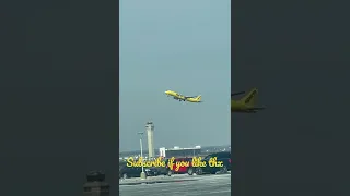 The yellow plane takeoff