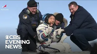 Christina Koch returns to Earth after record stay aboard space station