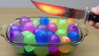 EXPERIMENT Glowing 1000 degree KNIFE VS Water Balloon!