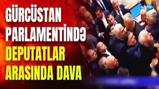 Deputatlar əlbəyaxa oldular, etirazçılar parlament binasına hücum etdi: Tbilisidə kritik vəziyyət