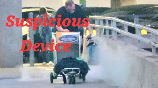 LAX airport police stopped a passenger with a suspicious device at LAX airport