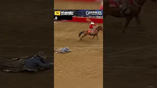 WILD! Cowboys dragging across the dirt at a rodeo. #cowboy #horse #rodeo