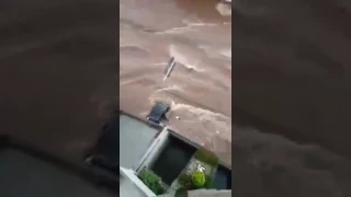 Car Swept Away by Severe Flooding in Uberaba, Brazil