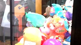 Kid gets claw machine stuck at safeway