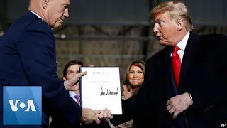 Trump Signs Defense Bill, Creates Space Force